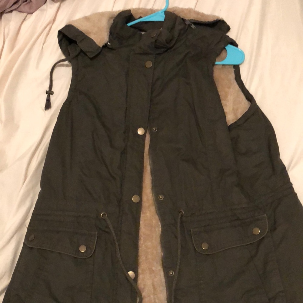 Dark green sleeve less jacket